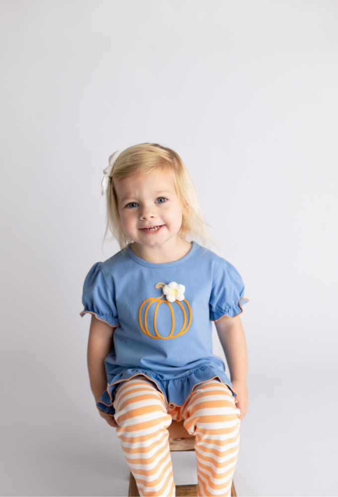 Fall_Holiday 2026 Childrens Wholesale Clothing - Girl with teal top and push-pop embroidery